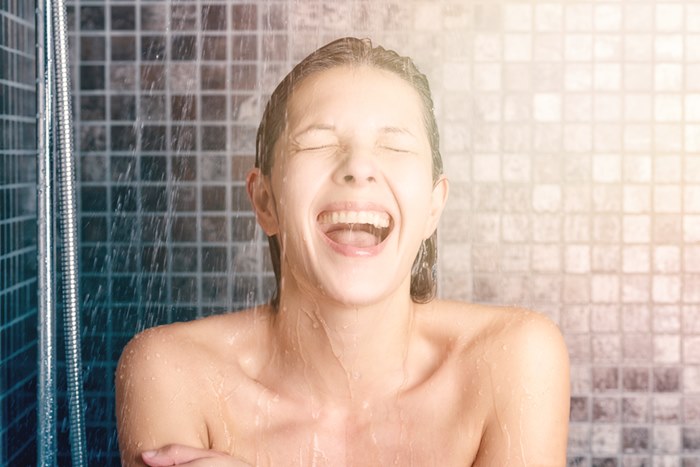 Happy Bare Young Woman Taking Shower