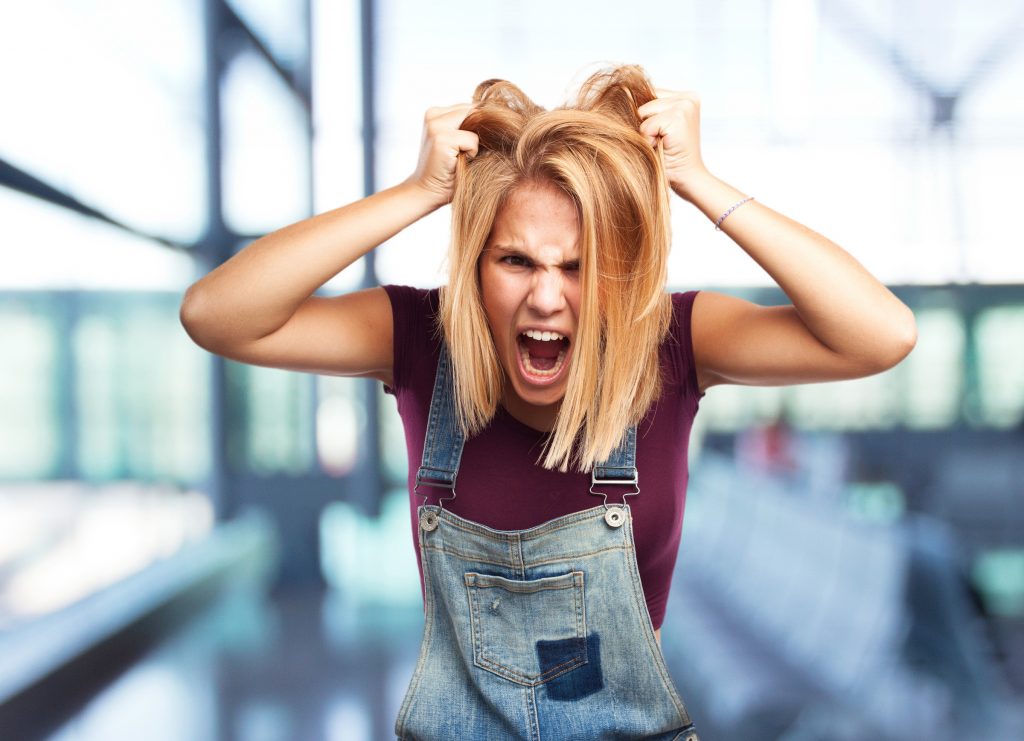 blond girl angry expression